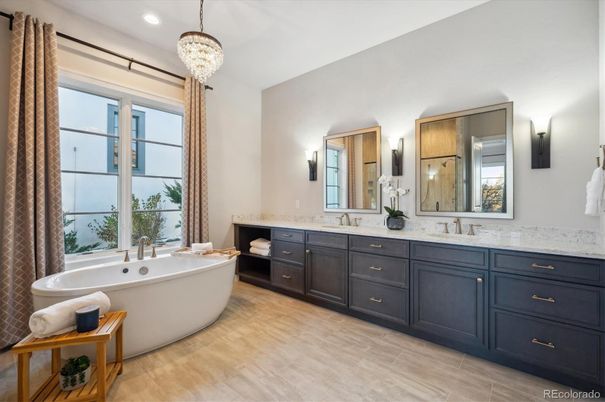 Bathroom, Chandelier, Dual Sink Vanities, Free Standing Baths, Interior, Pendant Lights, Recessed Lighting, Wood Texture Flooring