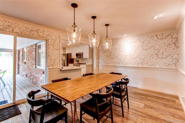 Dining room, Interior, Kitchen, Pendant Lights, Recessed Lighting, Stainless Steel Appliances, Wood Texture Flooring
