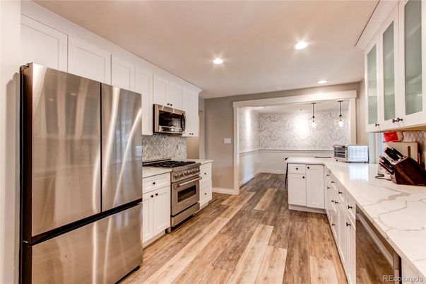 Interior, Kitchen, Pendant Lights, Recessed Lighting, Stainless Steel Appliances, Wood Texture Flooring