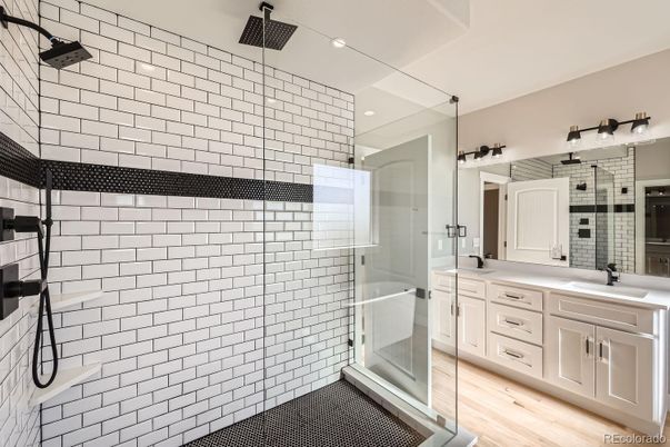 Bathroom, Dual Sink Vanities, Glass Shower, Interior, Recessed Lighting, Wood Texture Flooring