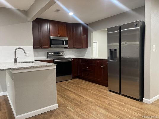 Interior, Kitchen, Recessed Lighting, Stainless Steel Appliances, Wood Texture Flooring
