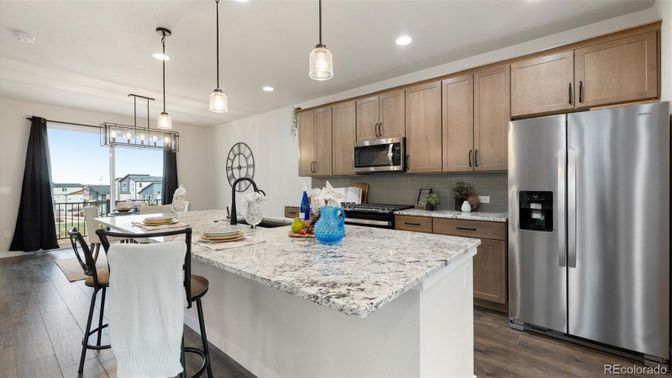 Dining room, Interior, Kitchen, Pendant Lights, Recessed Lighting, Stainless Steel Appliances, Wood Texture Flooring