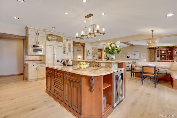 Chandelier, Dining room, Interior, Kitchen, Pendant Lights, Recessed Lighting, Stainless Steel Appliances, Wood Texture Flooring