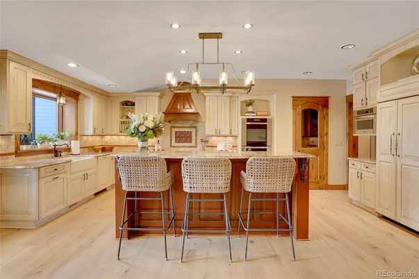 Chandelier, Interior, Kitchen, Pendant Lights, Recessed Lighting, Stainless Steel Appliances, Wood Texture Flooring
