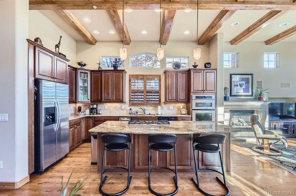 Fireplace, Interior, Kitchen, Pendant Lights, Recessed Lighting, Stainless Steel Appliances, Wooden Beams, Wood Texture Flooring