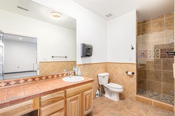 Bathroom, Glass Shower, Interior, Recessed Lighting, Tile Countertops