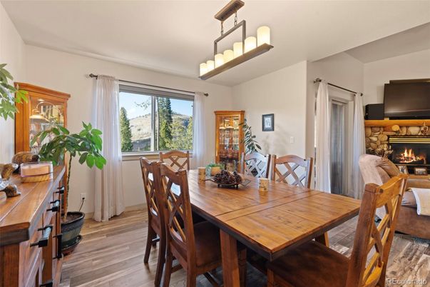 Chandelier, Dining room, Fireplace, Interior, Wood Texture Flooring