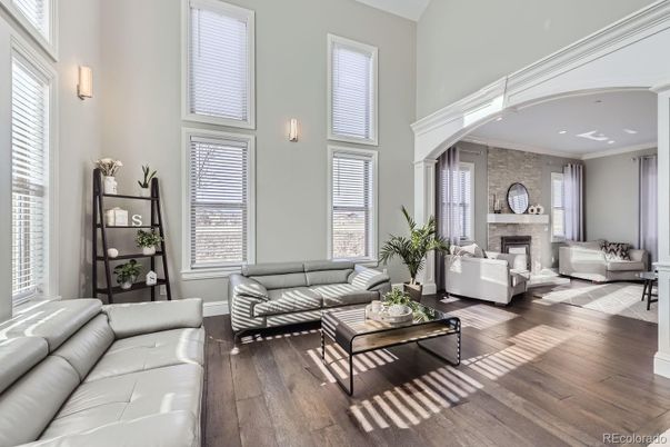 Fireplace, Interior, Living room, Recessed Lighting, Stone Walls, Wood Texture Flooring