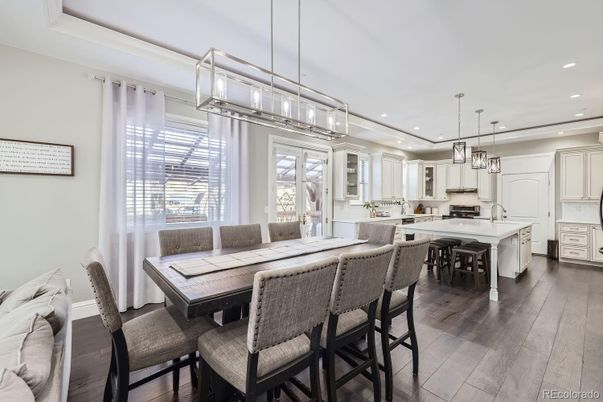 Dining room, Interior, Kitchen, Pendant Lights, Recessed Lighting, Stainless Steel Appliances, Wood Texture Flooring