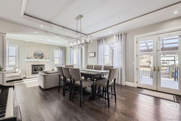 Dining room, Fireplace, Interior, Living room, Pendant Lights, Recessed Lighting, Stone Walls, Wood Texture Flooring