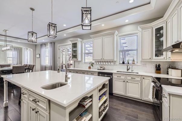 Dining room, Interior, Kitchen, Pendant Lights, Recessed Lighting, Stainless Steel Appliances, Wood Texture Flooring