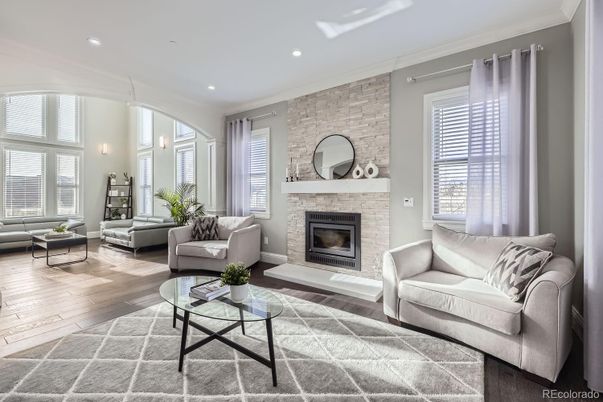 Fireplace, Interior, Living room, Recessed Lighting, Stone Walls, Wood Texture Flooring