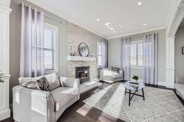 Fireplace, Interior, Living room, Recessed Lighting, Stone Walls, Wood Texture Flooring
