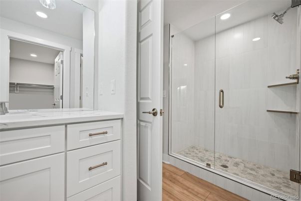 Bathroom, Glass Shower, Interior, Recessed Lighting, Wood Texture Flooring