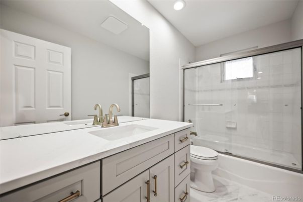Bathroom, Dual Sink Vanities, Glass Shower, Interior, Marble, Recessed Lighting