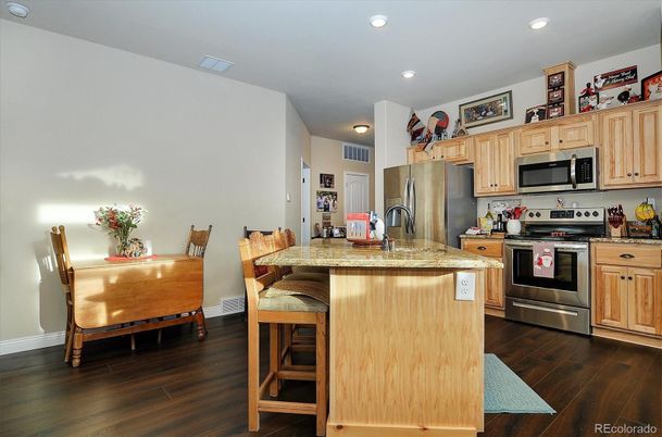 Dining room, Interior, Kitchen, Recessed Lighting, Stainless Steel Appliances, Wood Texture Flooring