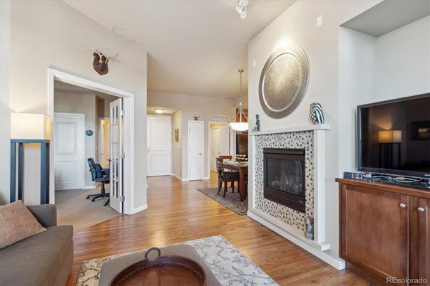 Dining room, Fireplace, Interior, Pendant Lights, Wood Texture Flooring