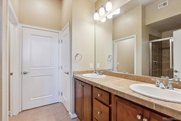 Bathroom, Dual Sink Vanities, Glass Shower, Interior, Tile Countertops