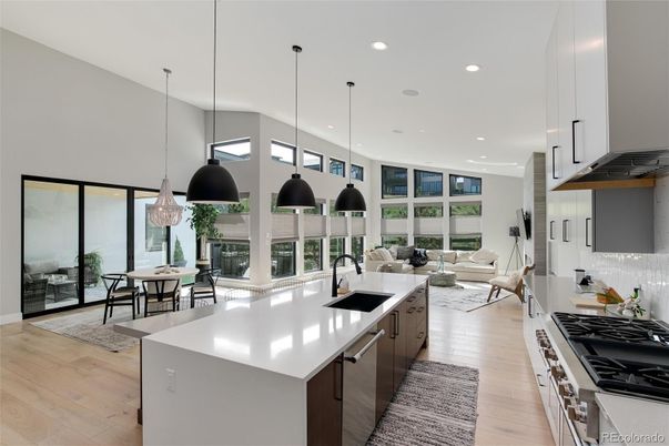 Dining room, Interior, Kitchen, Living room, Pendant Lights, Recessed Lighting, Stainless Steel Appliances, Wood Texture Flooring