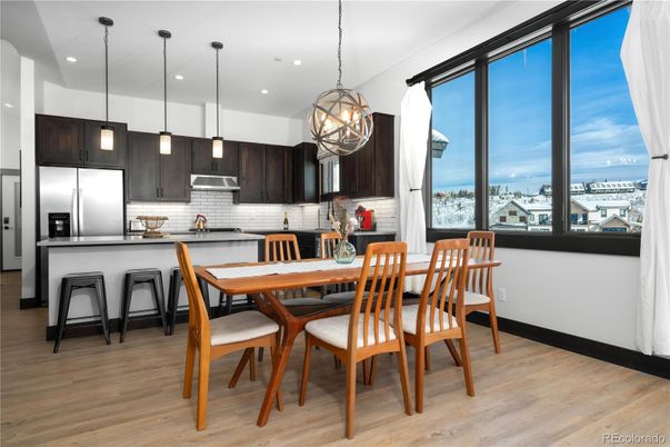 Dining room, Interior, Kitchen, Pendant Lights, Recessed Lighting, Stainless Steel Appliances, Wood Texture Flooring