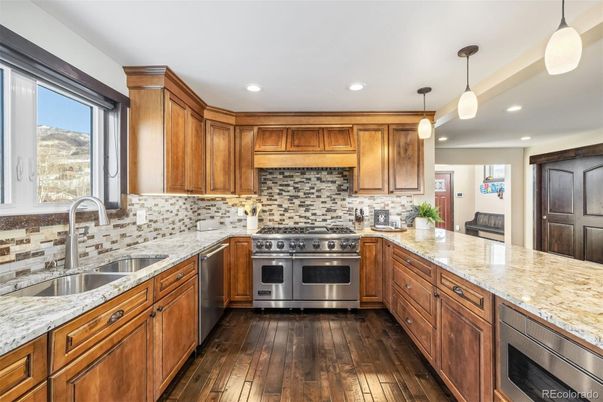 Interior, Kitchen, Pendant Lights, Recessed Lighting, Stainless Steel Appliances, Wood Texture Flooring