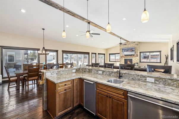 Dining room, Fireplace, Interior, Kitchen, Living room, Pendant Lights, Recessed Lighting, Stone Walls, Wood Texture Flooring