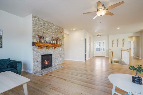 Fireplace, Interior, Recessed Lighting, Stone Walls, Wood Texture Flooring