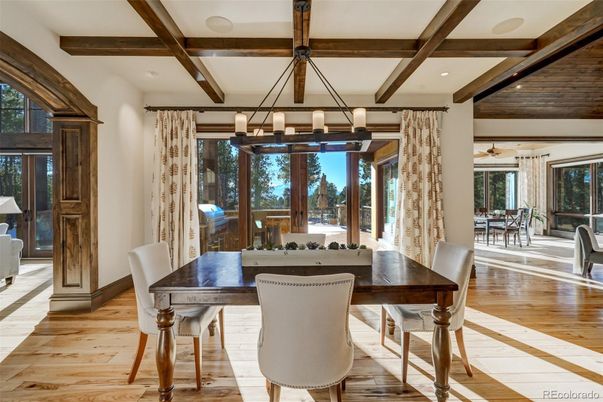 Chandelier, Dining room, Interior, Pendant Lights, Recessed Lighting, Wooden Beams, Wood Texture Flooring