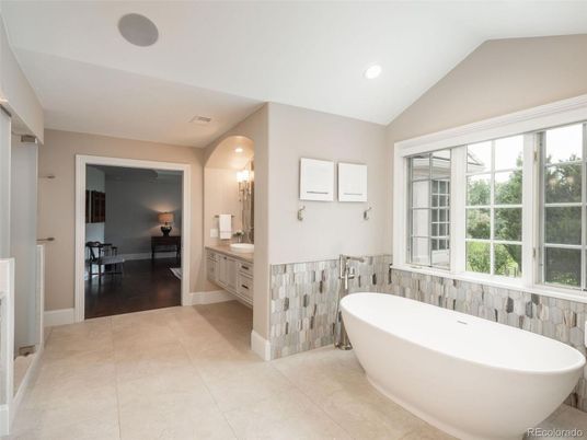 Bathroom, Dual Sink Vanities, Free Standing Baths, Interior, Recessed Lighting, Wood Texture Flooring
