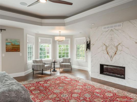 Fireplace, Interior, Marble Walls, Recessed Lighting, Wood Texture Flooring