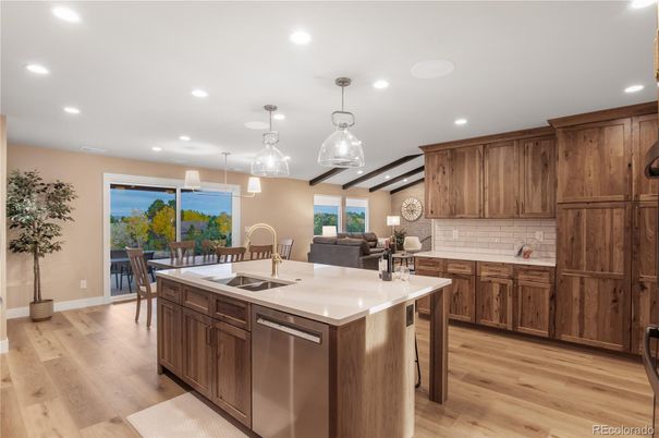 Dining room, Interior, Kitchen, Living room, Pendant Lights, Recessed Lighting, Stainless Steel Appliances, Wood Texture Flooring
