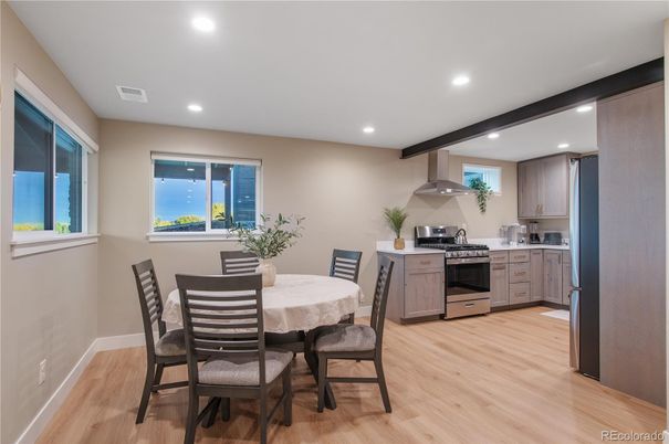 Dining room, Interior, Kitchen, Recessed Lighting, Stainless Steel Appliances, Wood Texture Flooring