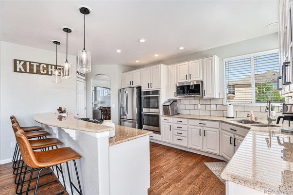 Interior, Kitchen, Pendant Lights, Recessed Lighting, Stainless Steel Appliances, Wood Texture Flooring