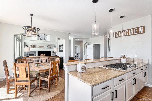 Dining room, Fireplace, Interior, Kitchen, Living room, Pendant Lights, Wood Texture Flooring