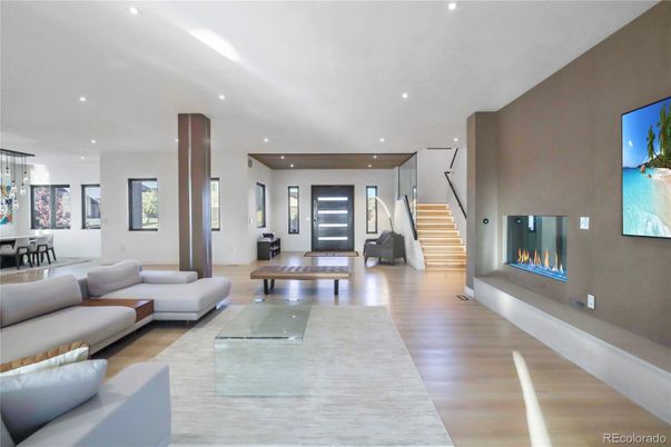 Dining room, Fireplace, Interior, Living room, Pendant Lights, Recessed Lighting, Wood Texture Flooring