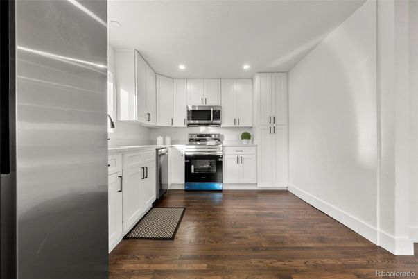 Interior, Kitchen, Recessed Lighting, Stainless Steel Appliances, Wood Texture Flooring