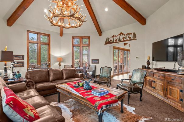 Chandelier, Interior, Living room, Recessed Lighting, Wooden Beams