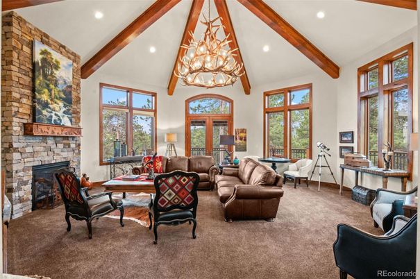 Chandelier, Fireplace, Home Office, Interior, Living room, Recessed Lighting, Stone Walls, Wooden Beams