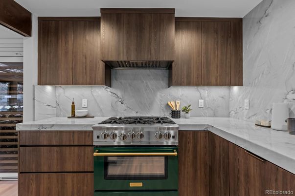 Interior, Kitchen, Marble Walls, Stainless Steel Appliances, Wood Texture Flooring