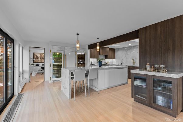 Interior, Kitchen, Marble Walls, Pendant Lights, Recessed Lighting, Wood Texture Flooring