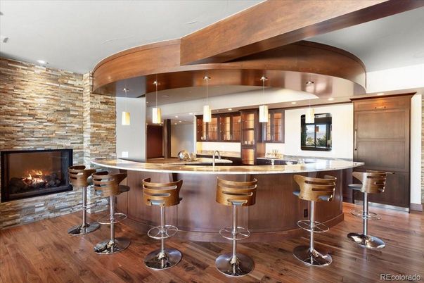 Fireplace, Interior, Pendant Lights, Recessed Lighting, Stone Walls, Wood Texture Flooring