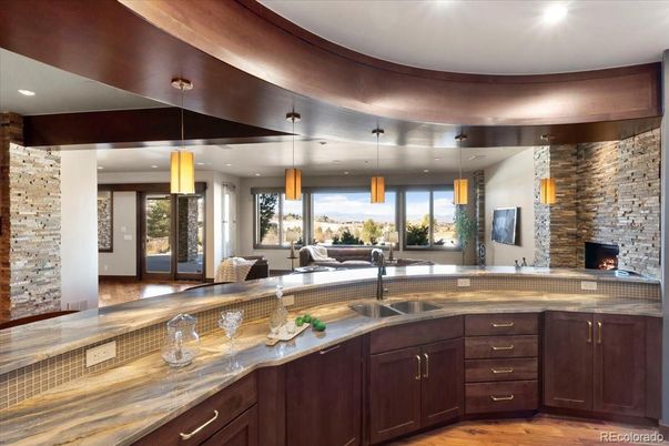 Fireplace, Interior, Pendant Lights, Recessed Lighting, Stone Walls, Wood Texture Flooring