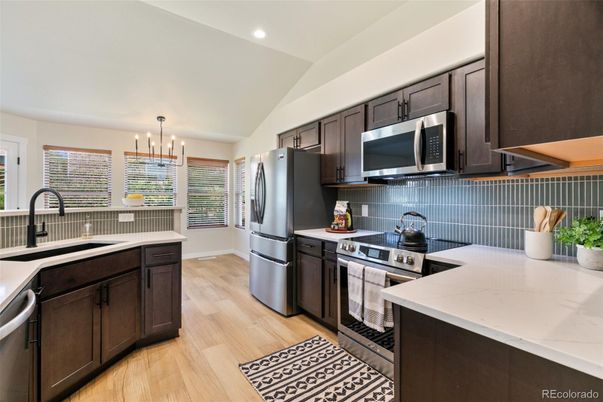 Interior, Kitchen, Pendant Lights, Recessed Lighting, Stainless Steel Appliances, Wood Texture Flooring