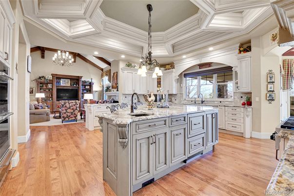 Chandelier, Interior, Kitchen, Living room, Pendant Lights, Recessed Lighting, Stainless Steel Appliances, Wood Texture Flooring