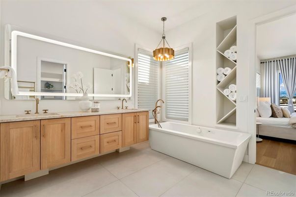 Bathroom, Dual Sink Vanities, Free Standing Baths, Interior, Pendant Lights, Wood Texture Flooring