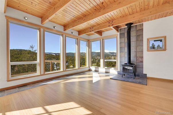Empty room, Fireplace, Interior, Sun Room, Wooden Beams, Wooden Ceilings, Wood Texture Flooring