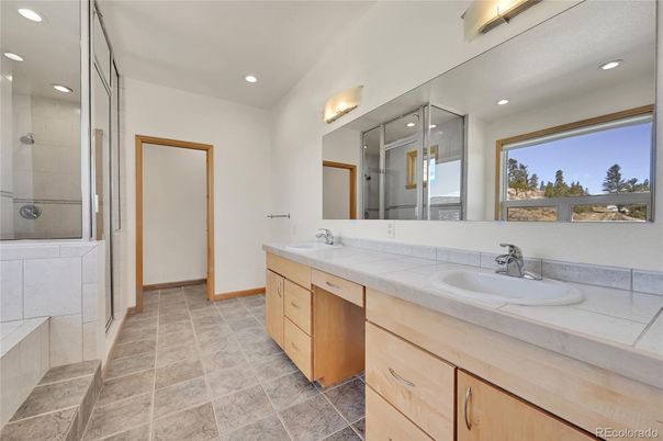 Bathroom, Dual Sink Vanities, Glass Shower, Interior, Recessed Lighting, Tile Countertops