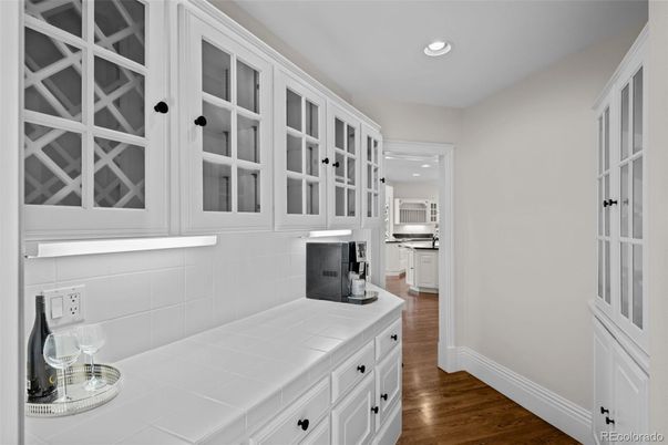 Interior, Kitchen, Recessed Lighting, Tile Countertops, Wood Texture Flooring