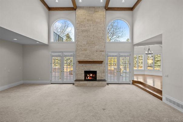 Empty room, Fireplace, Interior, Recessed Lighting, Stone Walls, Wooden Beams