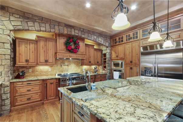 Interior, Kitchen, Pendant Lights, Recessed Lighting, Stainless Steel Appliances, Stone Walls, Wood Texture Flooring